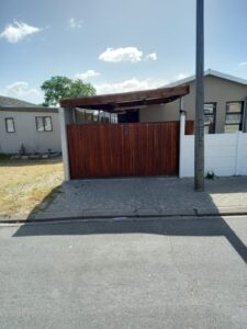 Motorized wooden gate